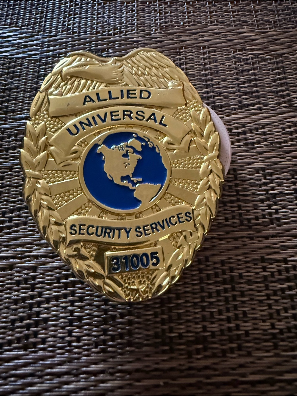 Allied Universal Security Services Badge Gold Blue.